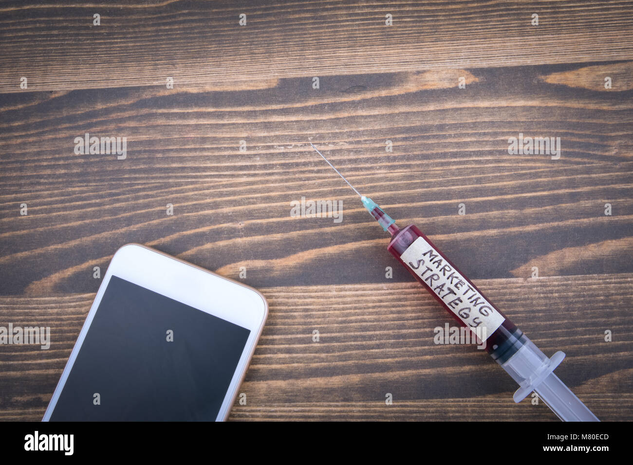 Marketing Strategie Konzept. Medizin Spritze mit Flüssigkeit und inscribtion Stockfoto