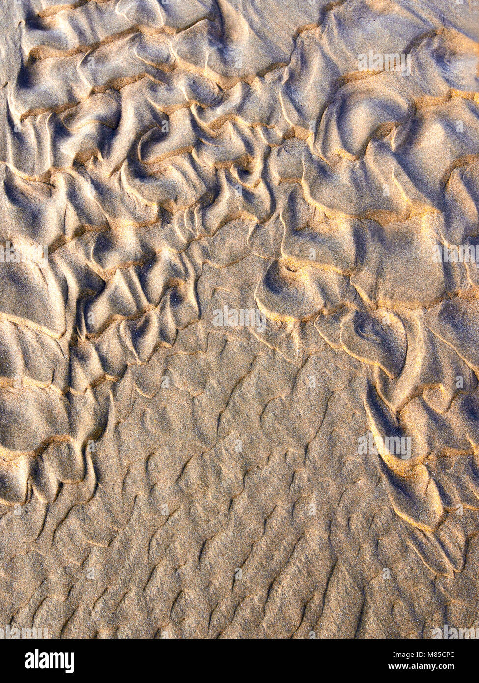 Eine Nahaufnahme eines komplizierten sand Muster auf Barmouth Beach, North Wales, UK. Stockfoto