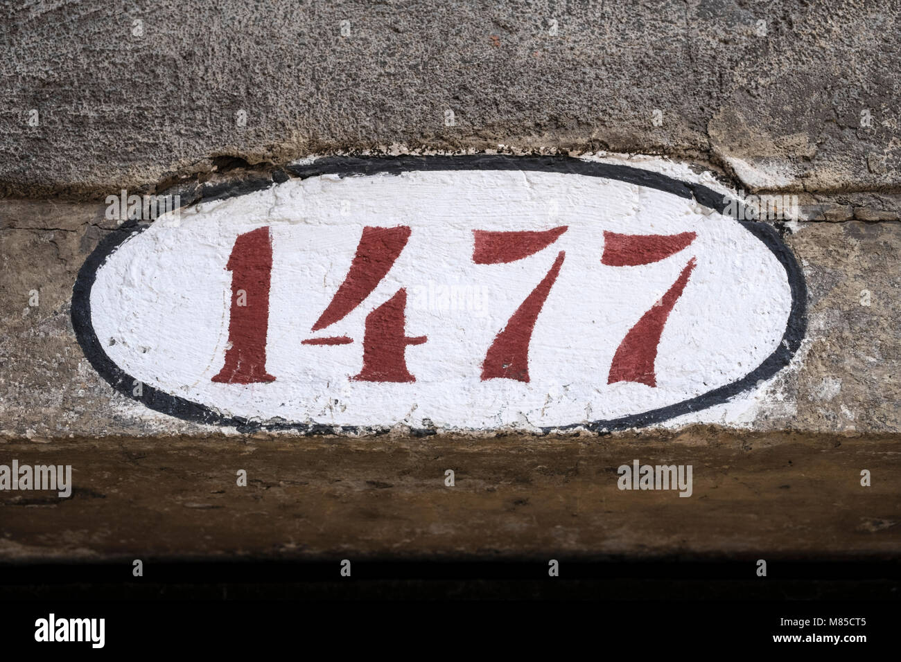 Hausnummer auf eine Mauer in den Straßen von Venedig, Italien, lackiert Stockfoto