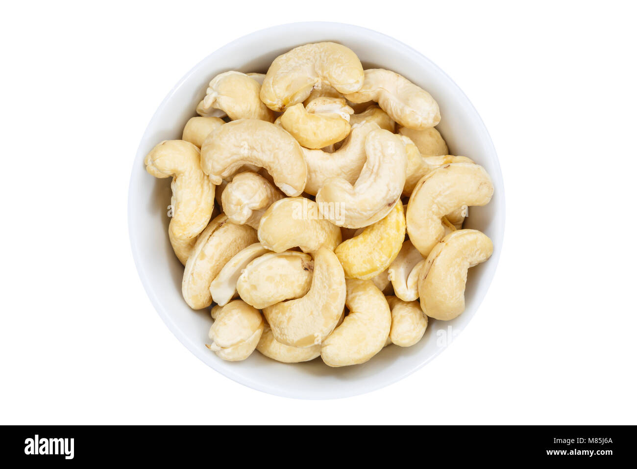 Cashewnüsse cashews von oben Schüssel auf weißem Hintergrund Stockfoto