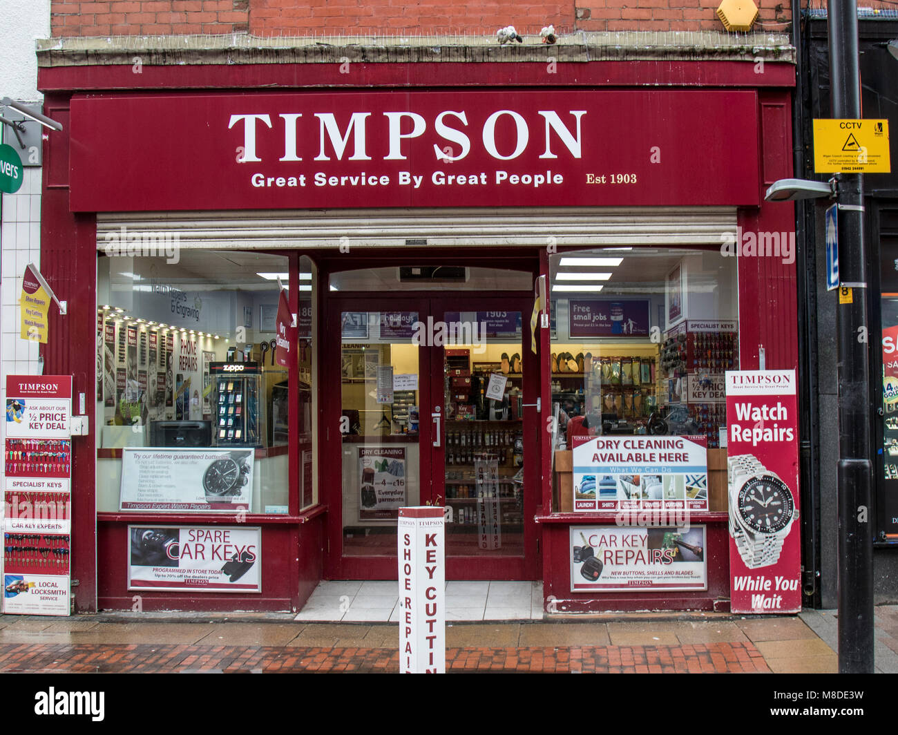 Timpson Schuh Reparaturen, Bradshawgate, Leigh Lancashire Stockfoto