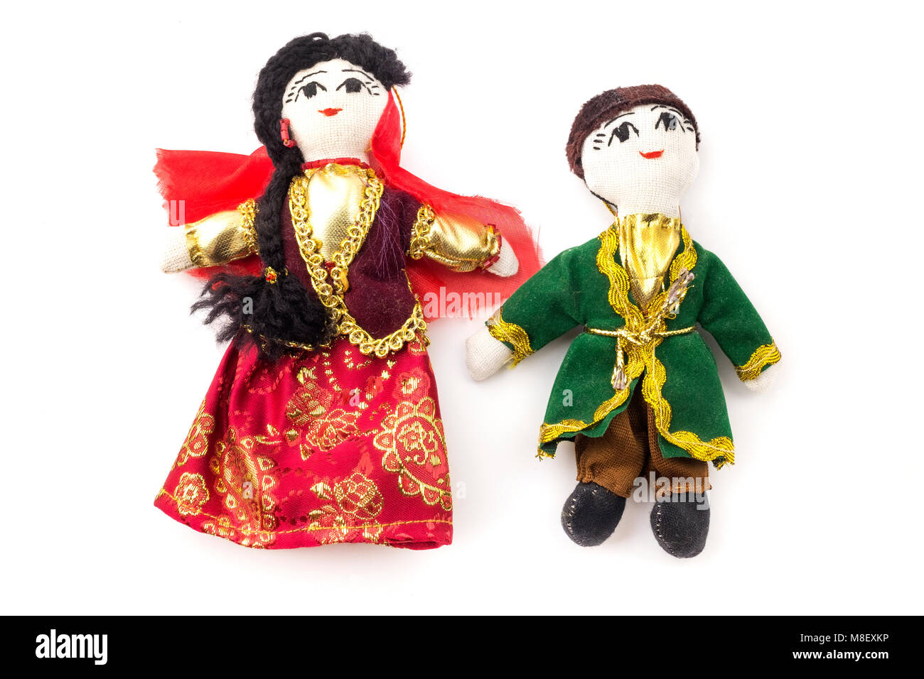 Puppen mit traditionellen aserbaidschanischen Kleid auf weißem Hintergrund Stockfoto