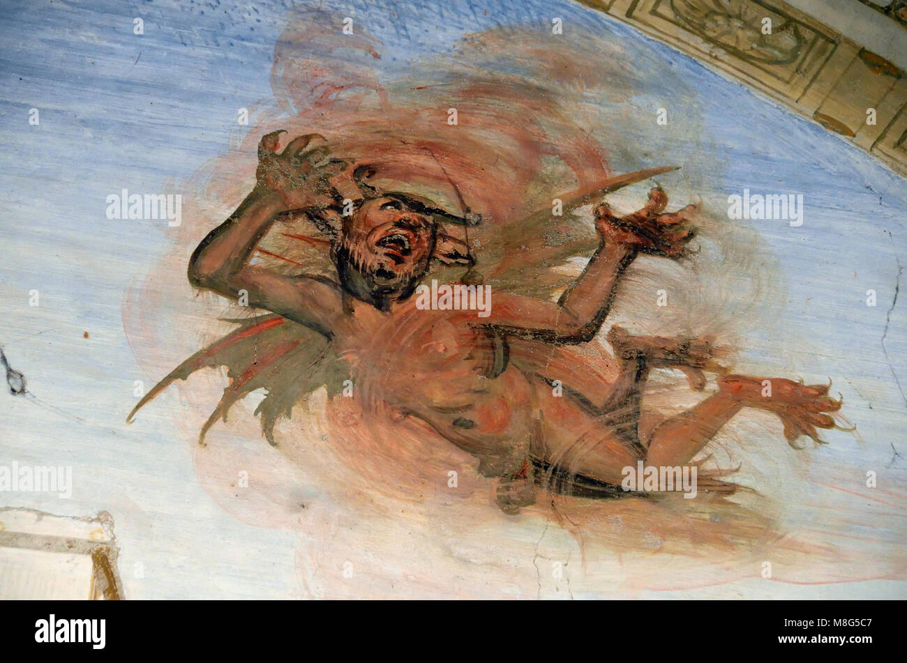 Gemälde von Satan im Kreuzgang der Abtei von Monte Oliveto Maggiore, Toskana, Italien. Stockfoto
