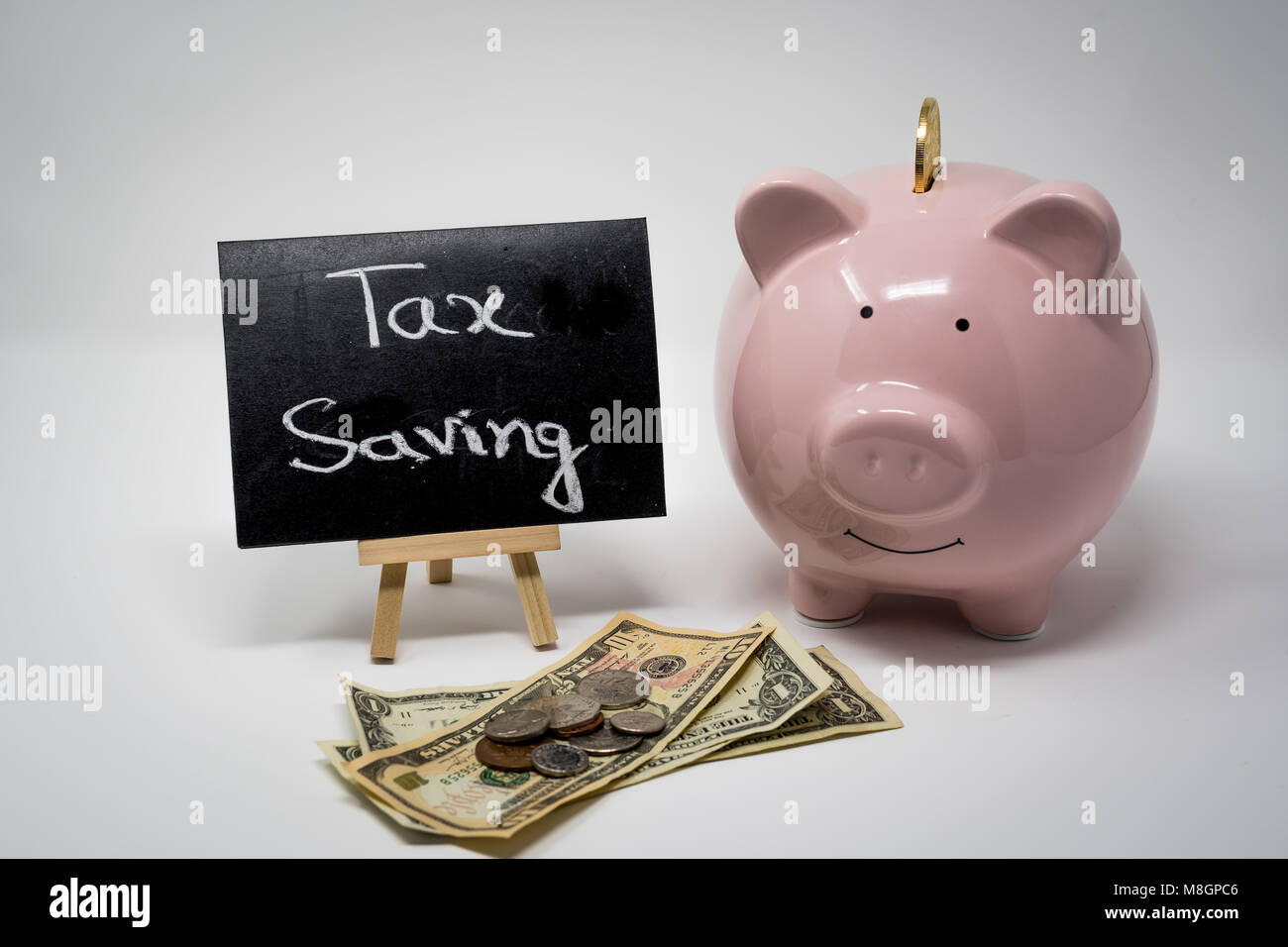 Steuern sparen und Geld sparen Stockfoto