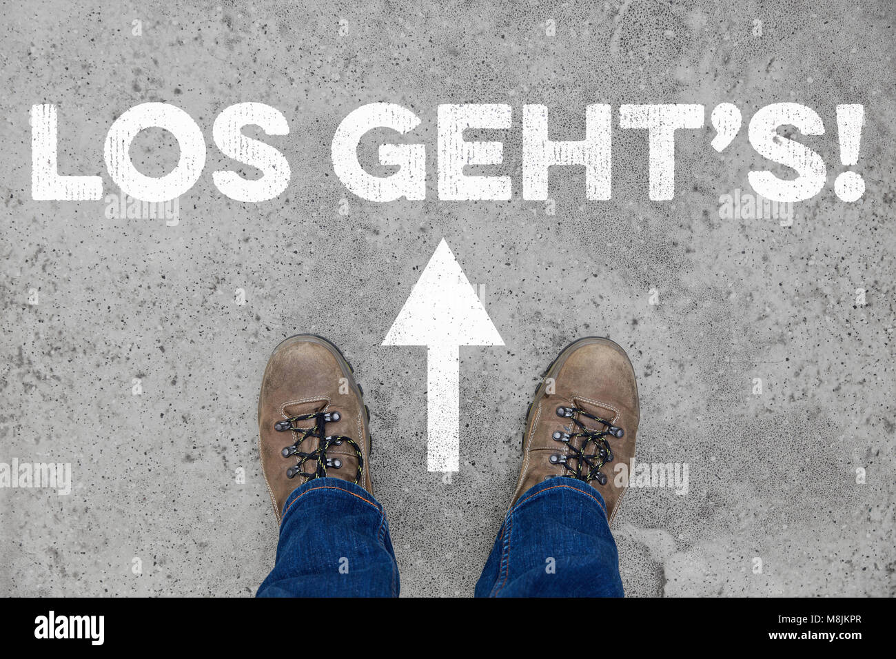 Deutsche Slogan 'Los geht's' (Let's go) mit Pfeil als Start Konzept auf