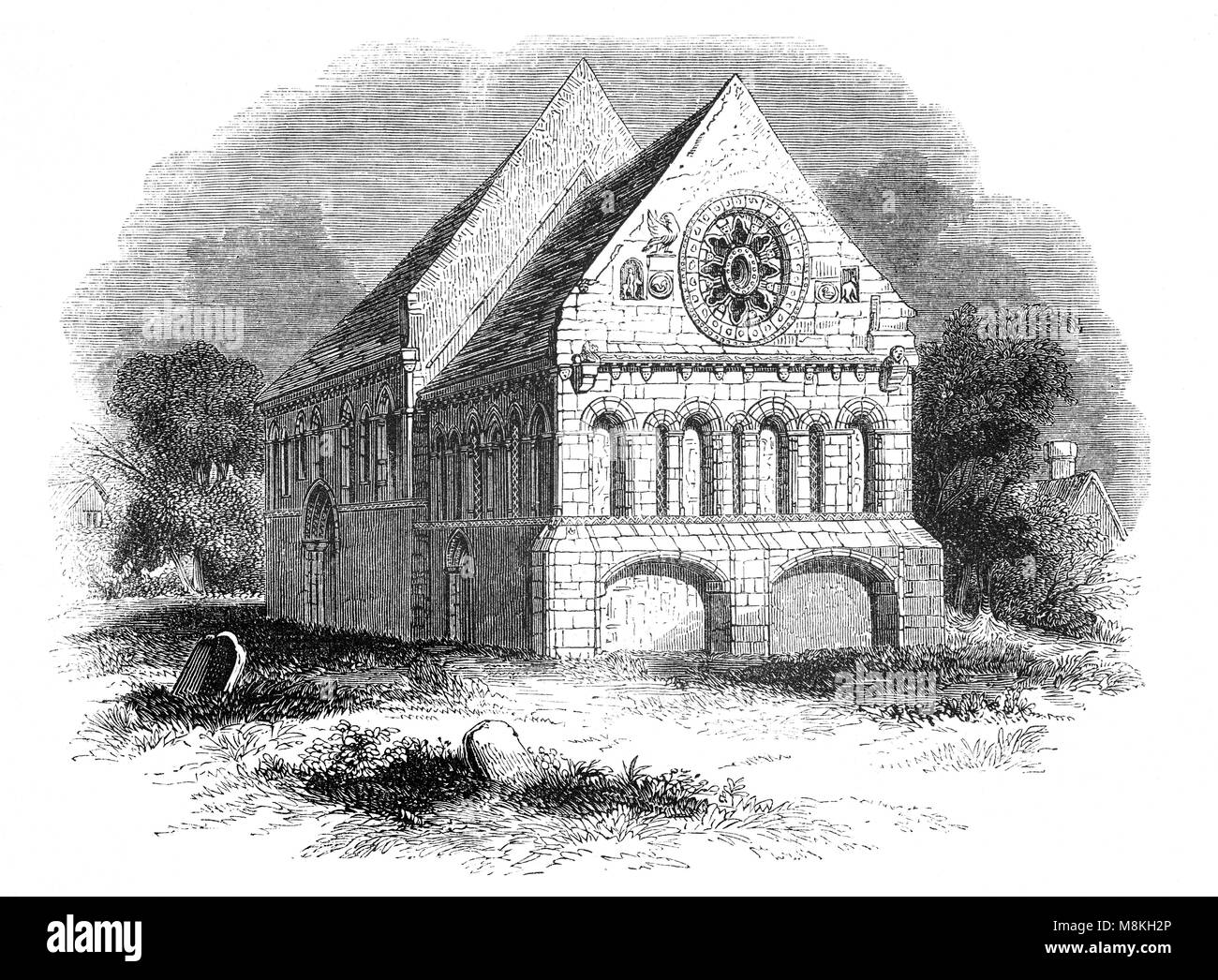 Kirche St. Nikolaus Barfreston in Kent, England, wurde vermutlich im 12. Jahrhundert gegründet. Dass die frühen Norman Gebäude wurde um 1180 umgebaut, mit dem Zusatz von über 100 tolle Schnitzereien an der Tür (siehe ILLU03003). In der mittelalterlichen Periode, das Dorf Barfreston wurde ein Zwischenstopp für Pilger auf dem Weg zum Schrein des Hl. Thomas Becket in Canterbury. Das mag der Grund für die Ähnlichkeit von Becket geschnitzt an der Tür, der erste bekannte Darstellung von Becket im Land. Stockfoto