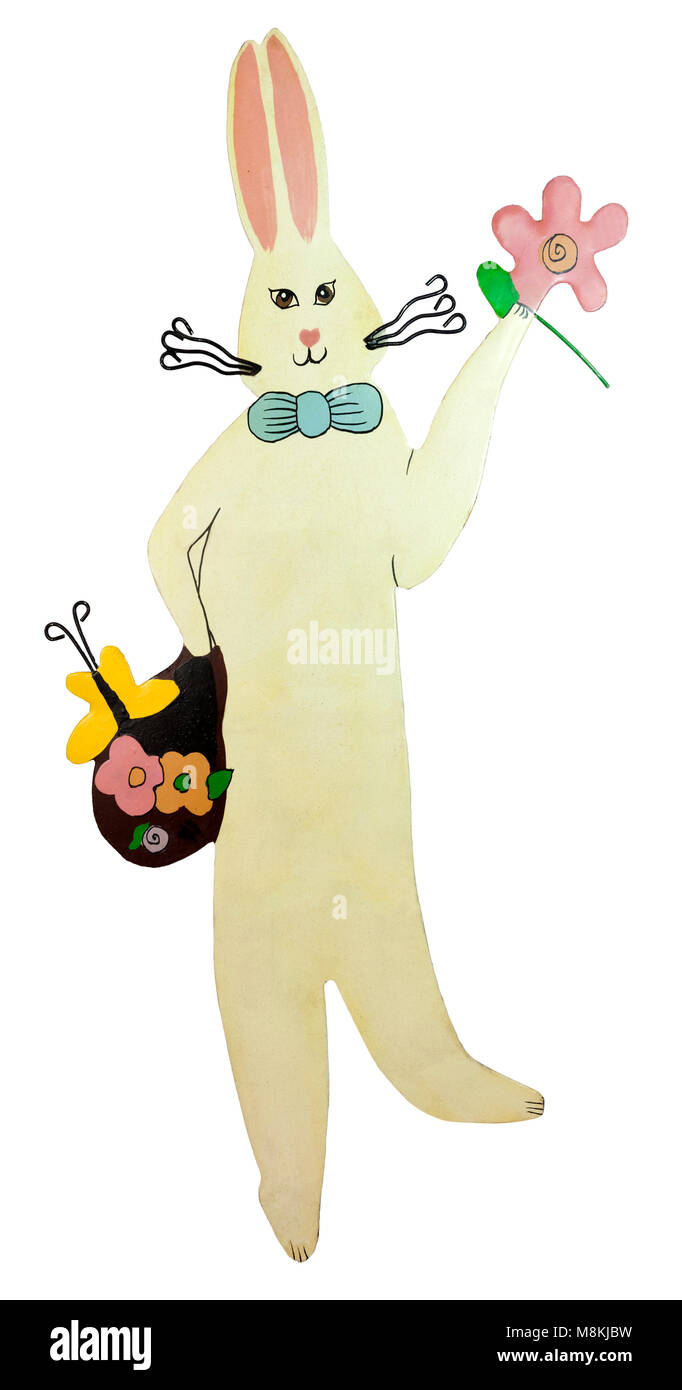 Vintage handmade Metall Osterhase mit Korb und Frühlingsblumen. Stockfoto