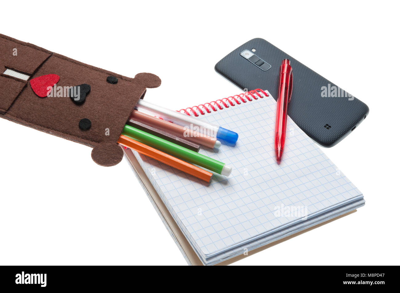 Fall für Stifte und Telefon in der Form eines Bären auf Weiß Stockfoto
