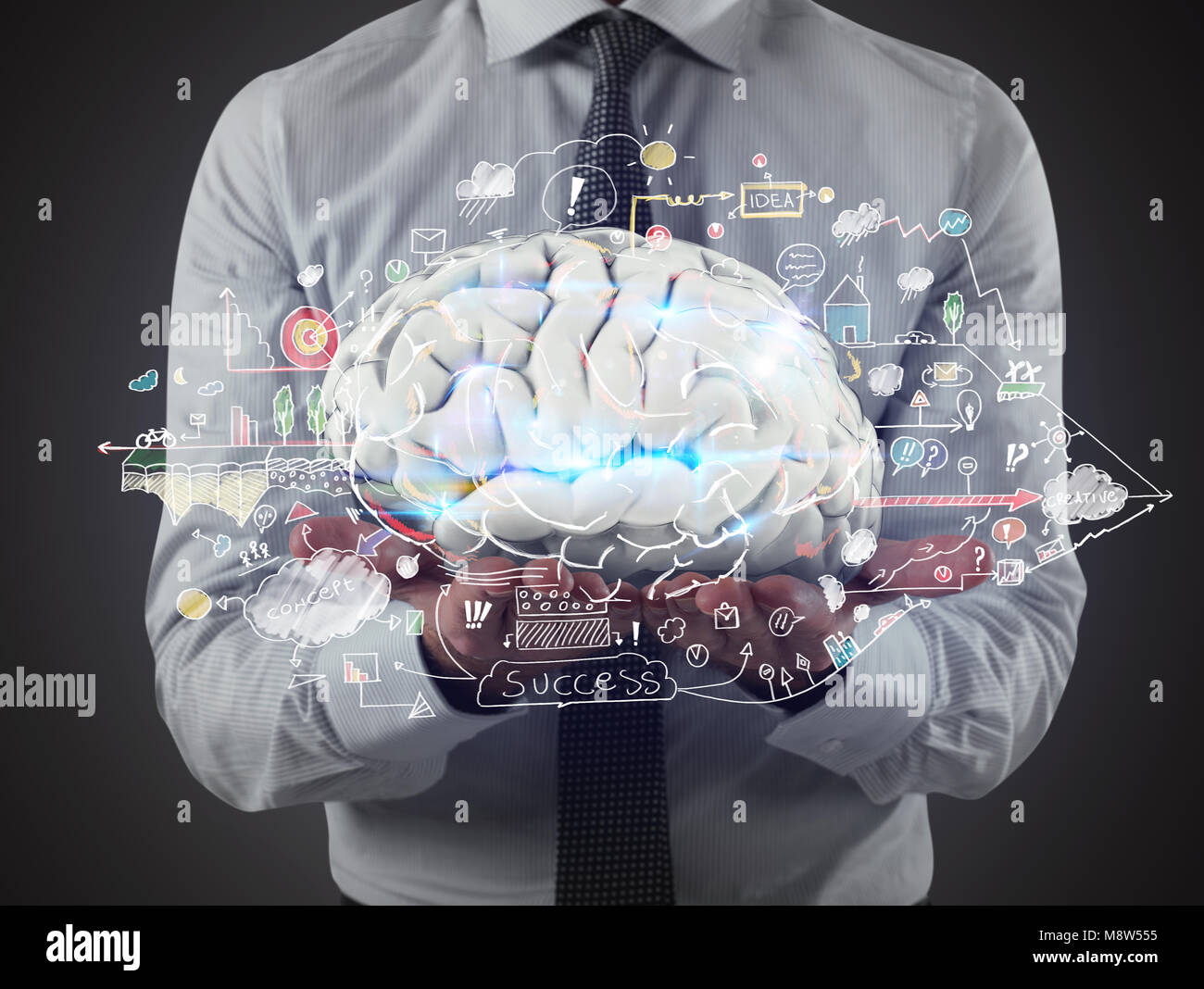 Mann hält ein Gehirn mit Business Skizzen auf seine Hände. 3D-Rendering Stockfoto