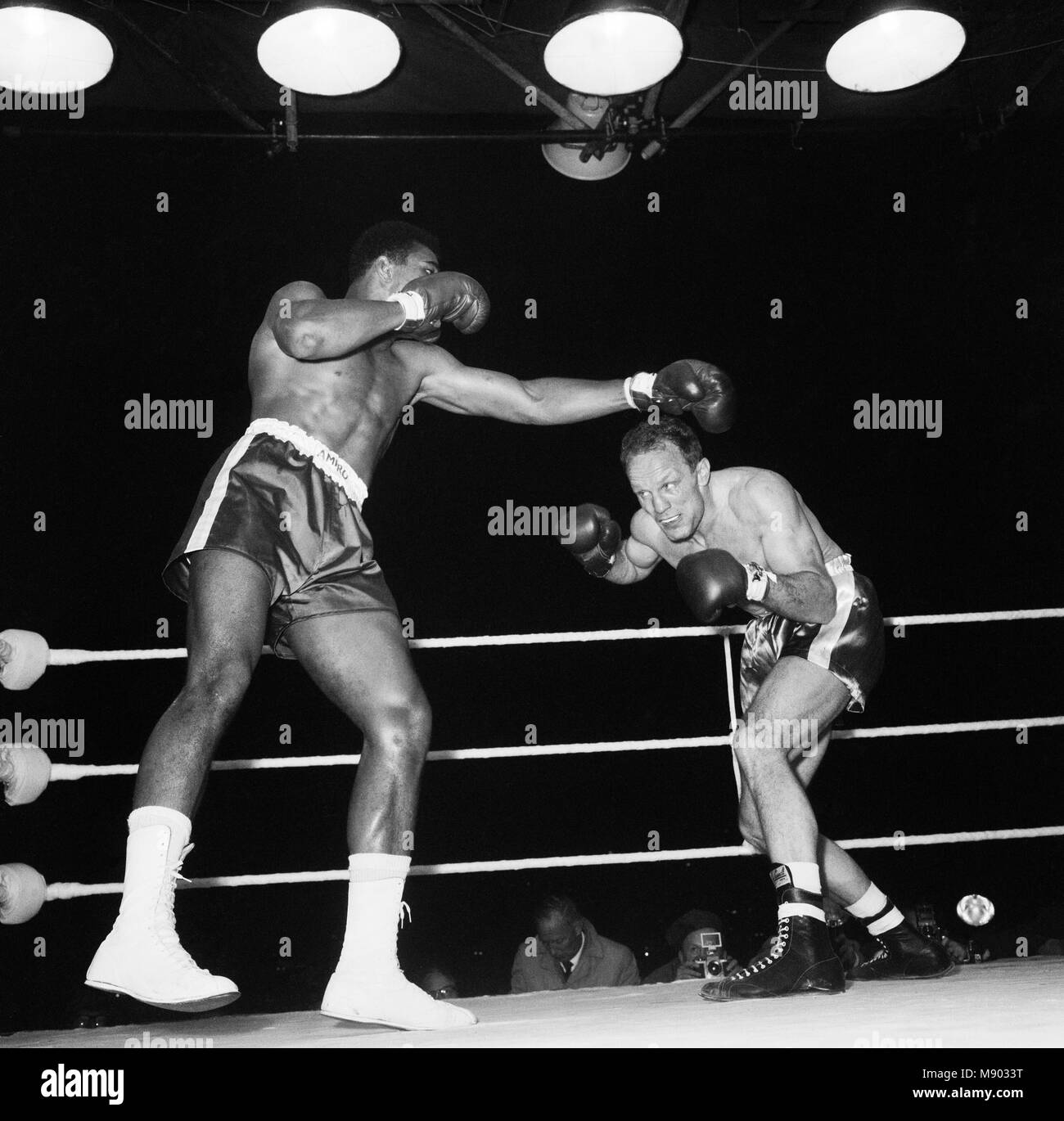Cassius Clay aka (Muhammad Ali) vs Henry Cooper in their first fight at Wembley Stadium. Clay stopped Cooper in the 5th round. 18th June 1963