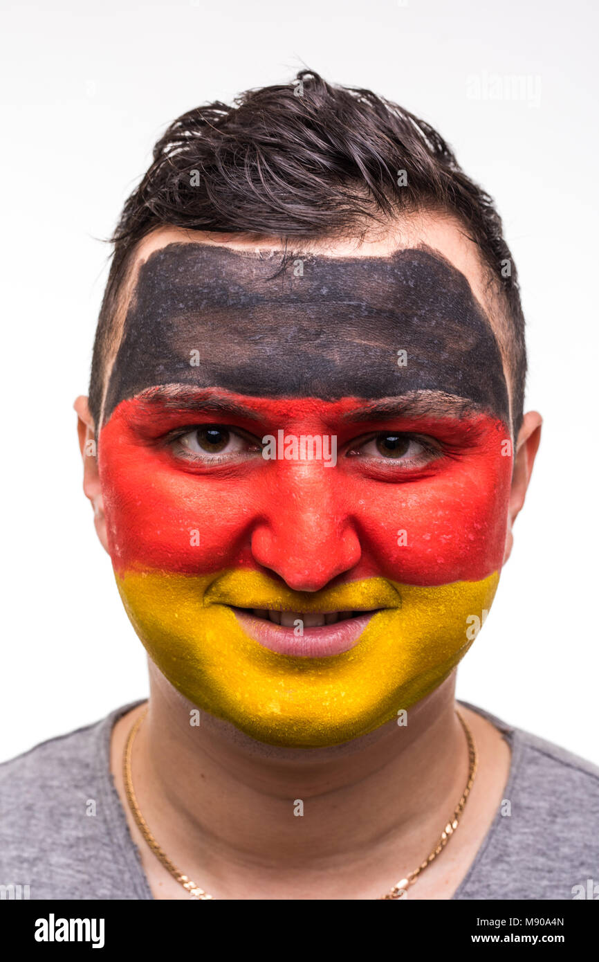 Schöner mann Unterstützer treuen Fan des Iran national team bemalte Flagge Gesicht Stockfoto