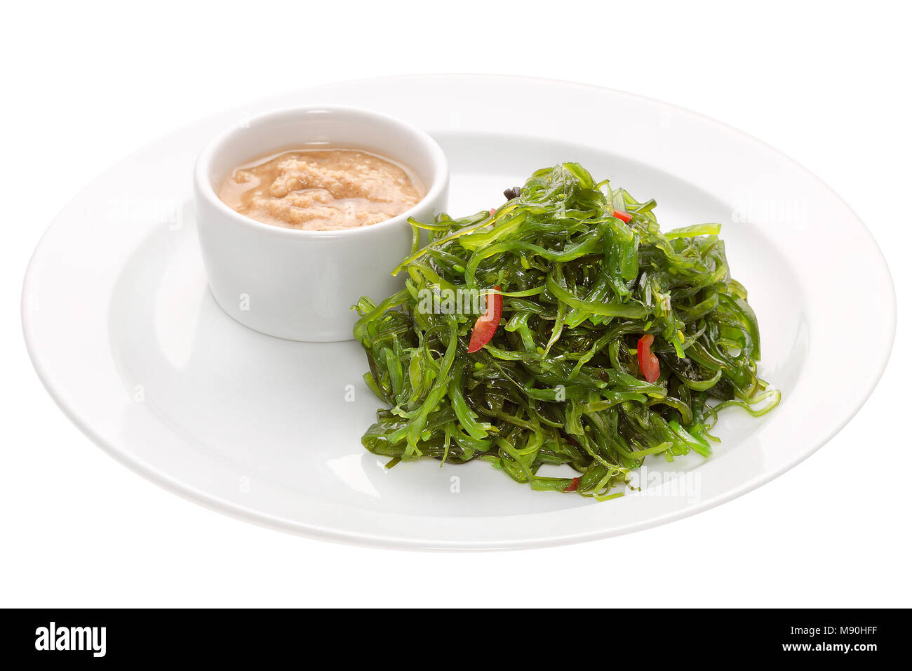 Salat Chuka Algen mit Erdnuss-sauce isoliert Stockfoto