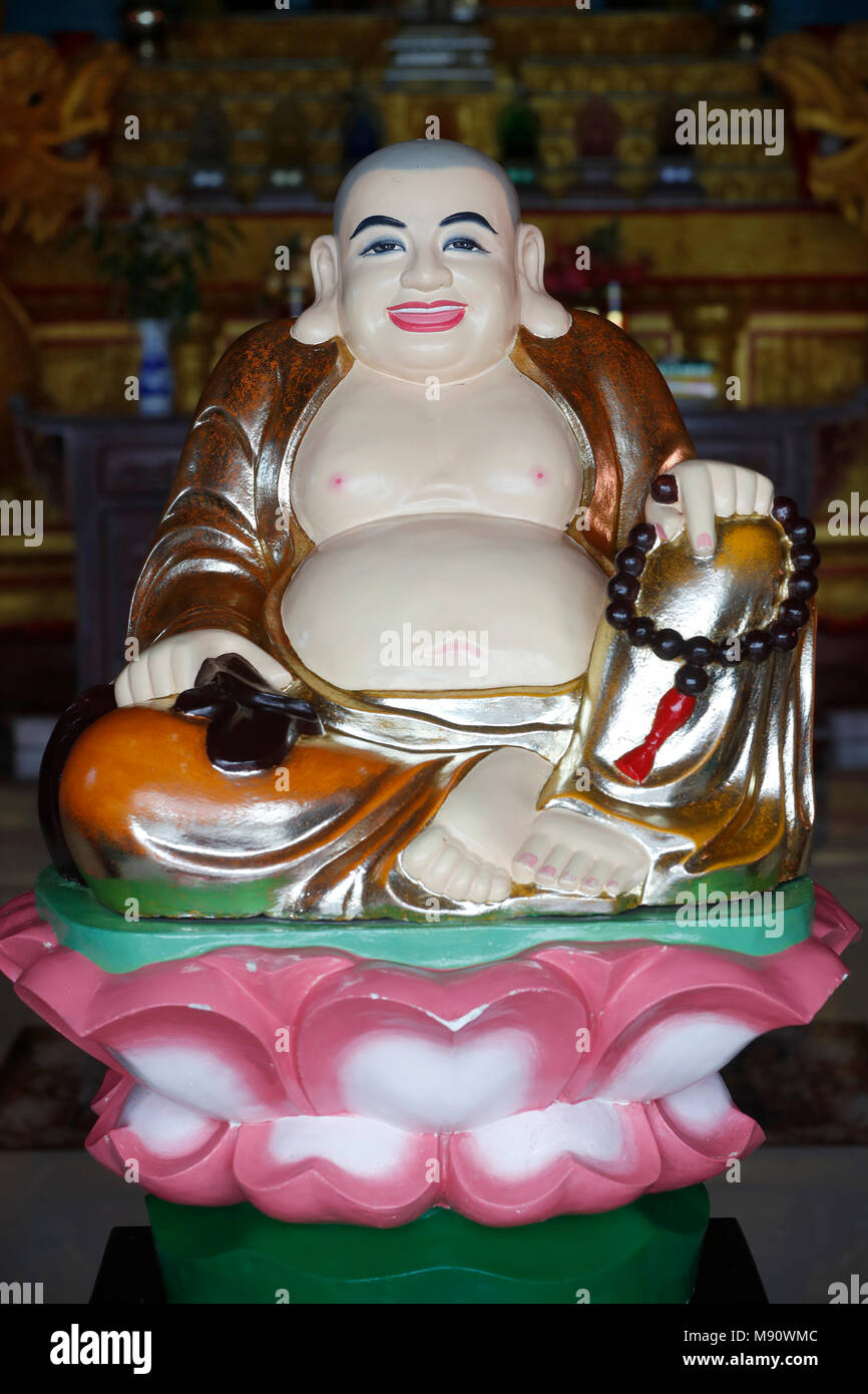 Chua Tu Quang buddhistischer Tempel. Happy Buddha Statue für Glück und Reichtum. Vung Tau. Vietnam. Stockfoto