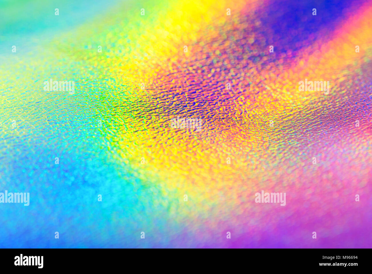 Rainbow real holografische Folie Textur Hintergrund. Holographische Hintergrund. Lebendige neon Textur. Trendy Hintergrund. Stockfoto
