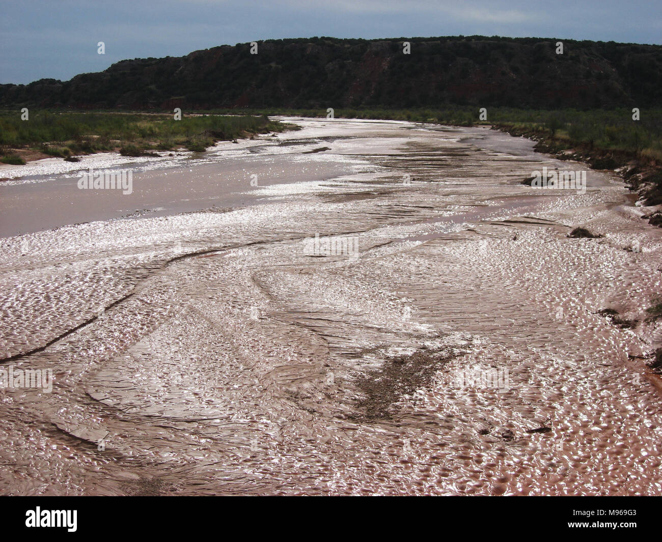 Muddy rippled Red River in Texas Stockfoto