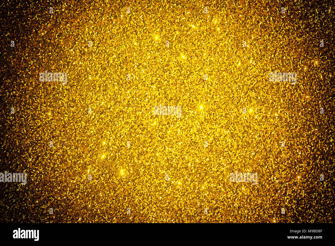 Abstrakte golden Sparkle glitter glänzend Urlaub Textur. Gold flachen Tiefe Hintergrund. Grußkarte Vorlage. Kopieren Sie Platz. Stockfoto