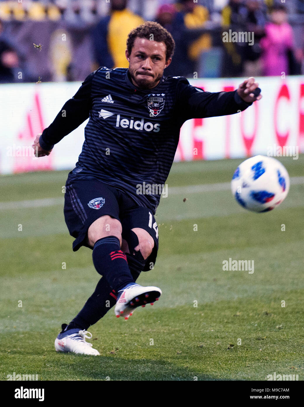 Columbus, Ohio, USA, 24. März 2018: D.C. United Mittelfeldspieler Nick DeLeon (14) dient den Ball gegen Columbus Crew SC in Columbus. Columbus, Ohio, USA. Brent Clark/Alamy leben Nachrichten Stockfoto