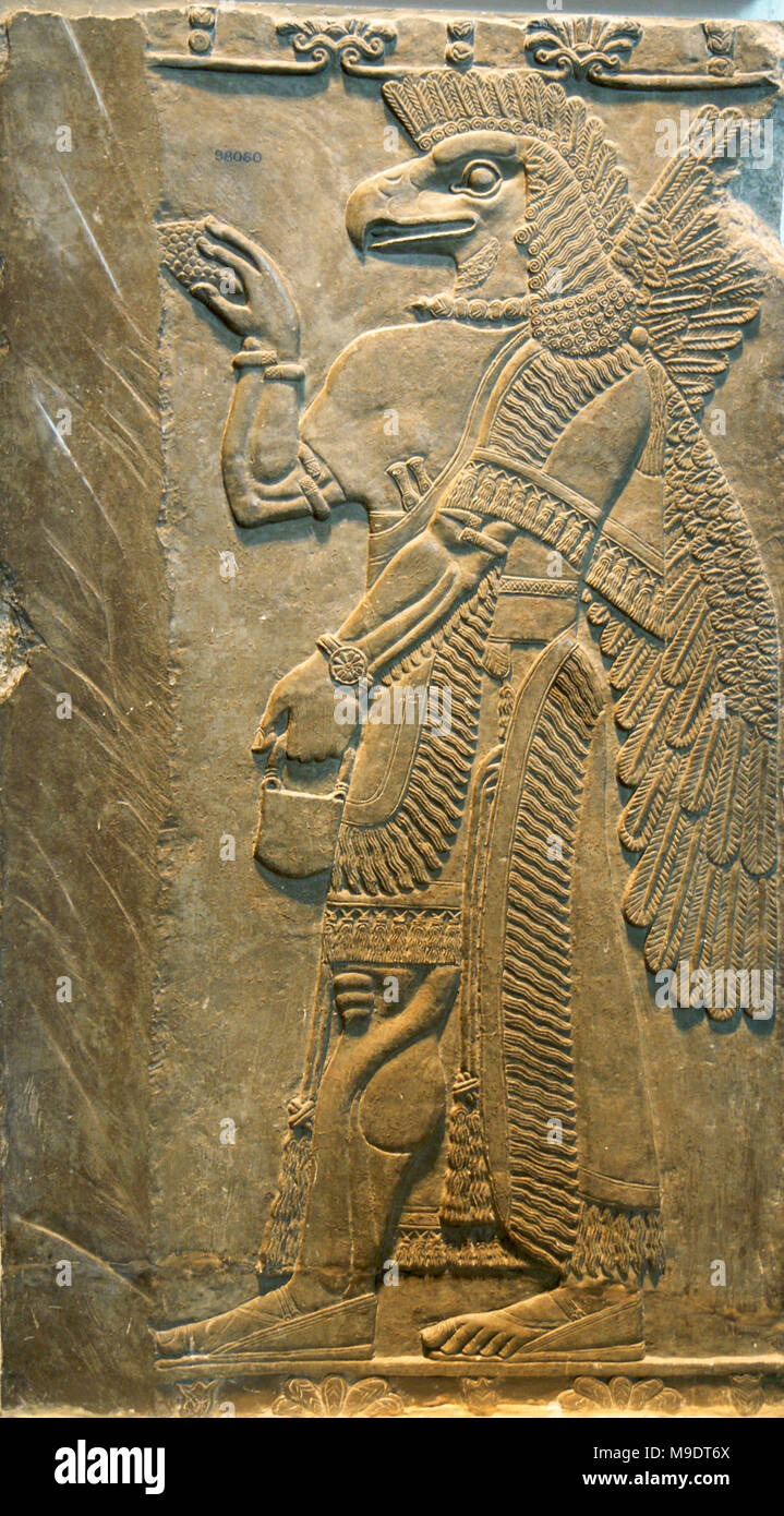 Relief mit schützenden Geist (Eagle-Leitung). Von assyrischen Tempel von Ninurta, Nimrud, ca. 865-860 v. Chr.. Stockfoto