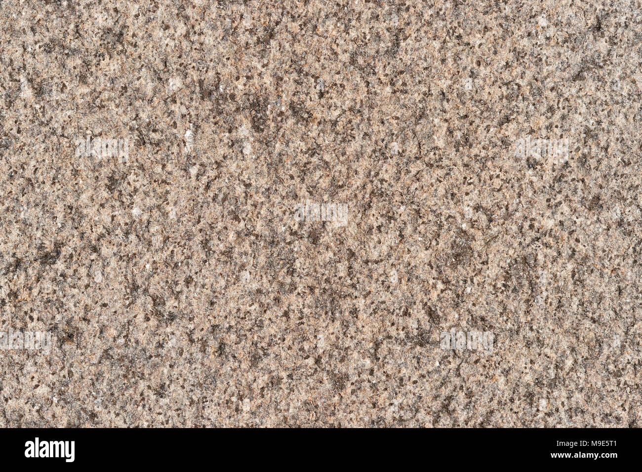 Textur einer harten Granit Stein Platte. Glatt elegante Mehrfarbige Oberfläche Stockfoto
