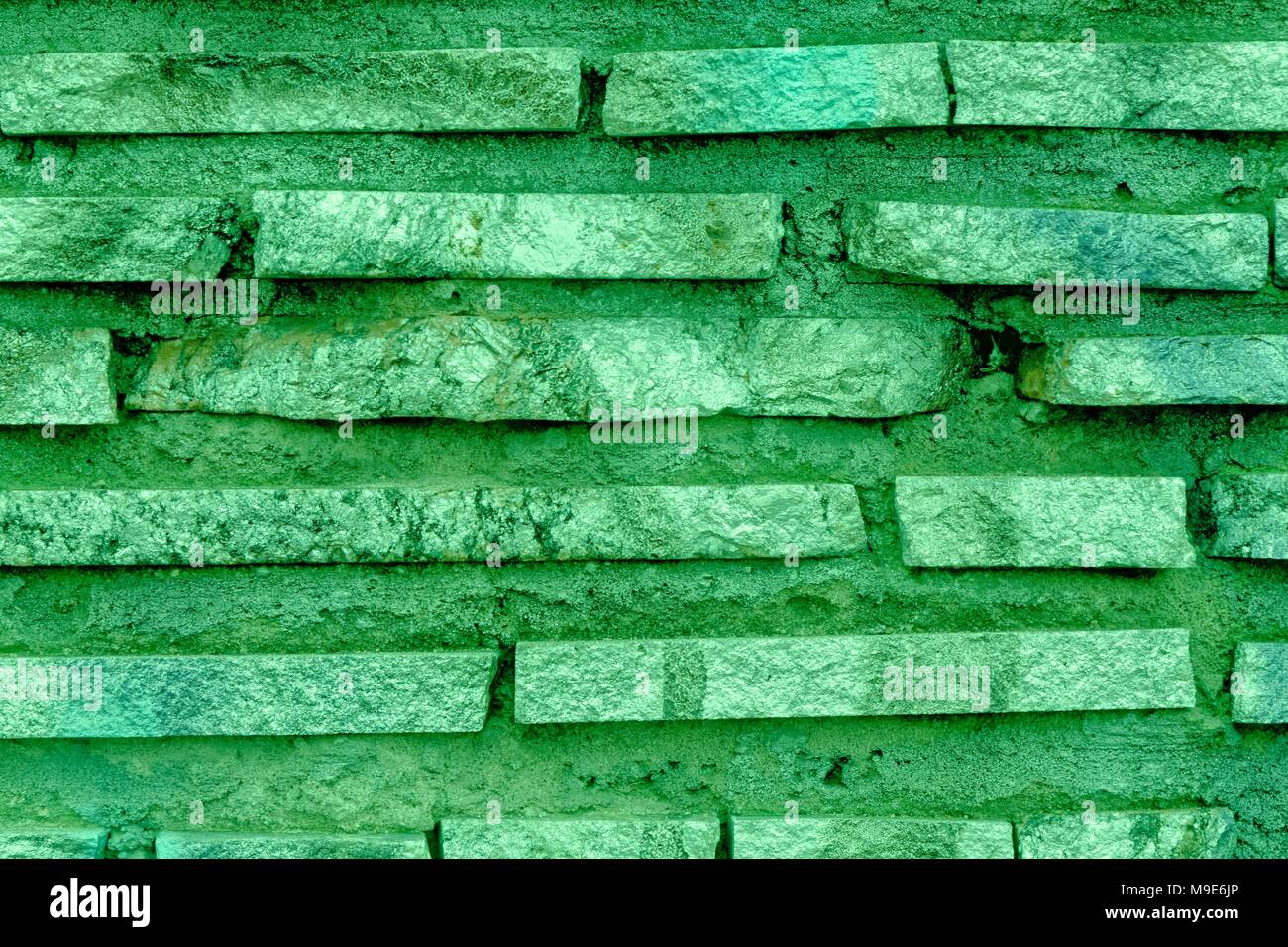 Grunge schattigen Fichte Mauer Textur, Hintergrund aus Stein, Fels Oberfläche. Stockfoto