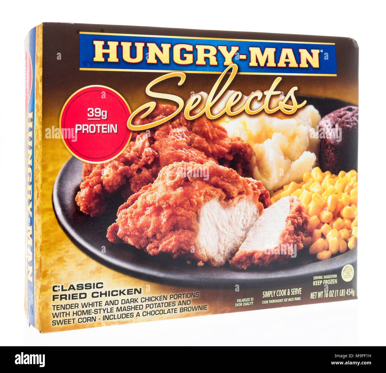 Winneconne, WI - 21. März 2018: Eine Box mit hungrigen Mann wählt Mahlzeit im klassischen gebratenes Huhn auf einem isolierten Hintergrund. Stockfoto