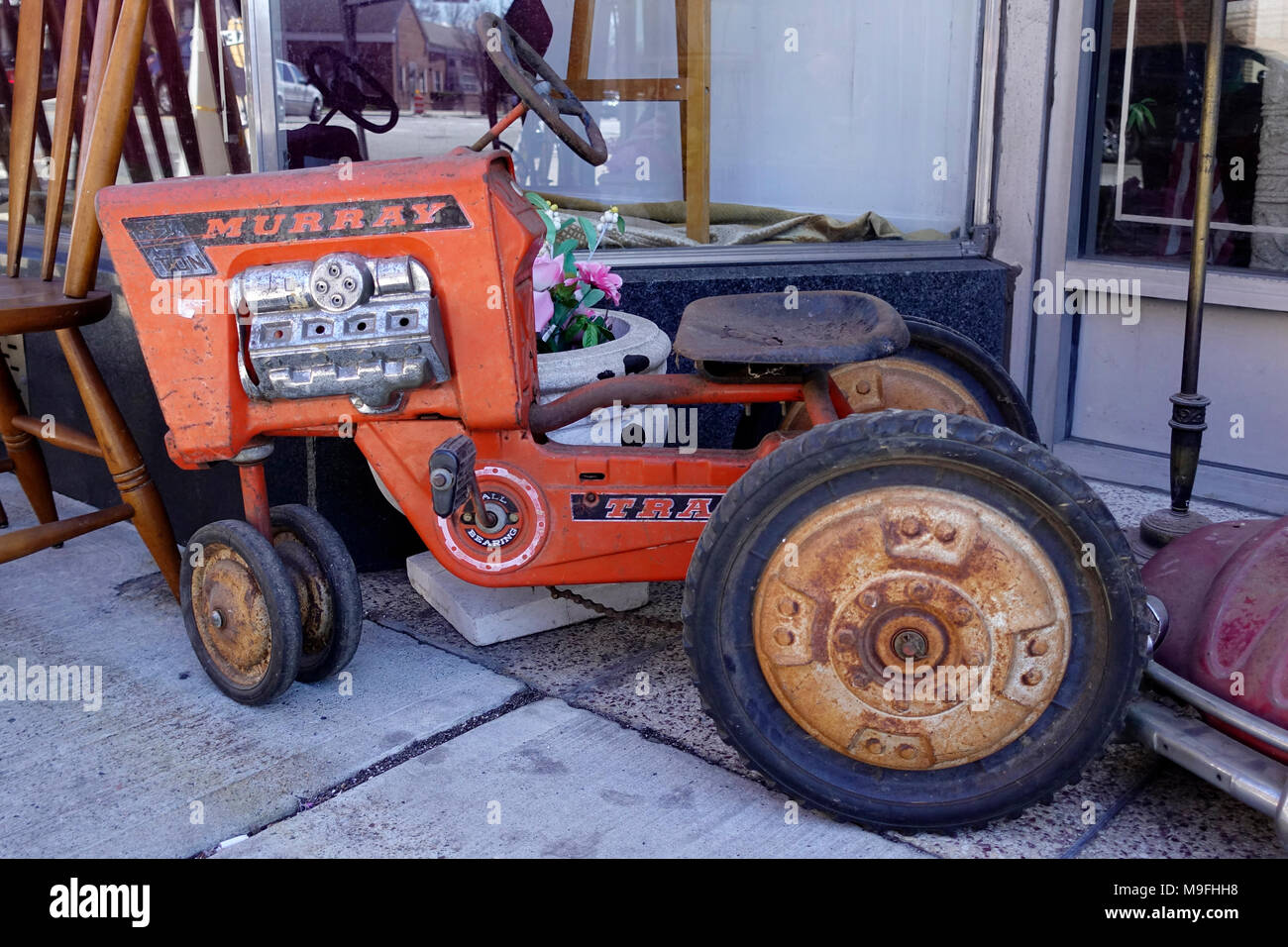 Die Vintage Kind Trettraktor Stockfoto