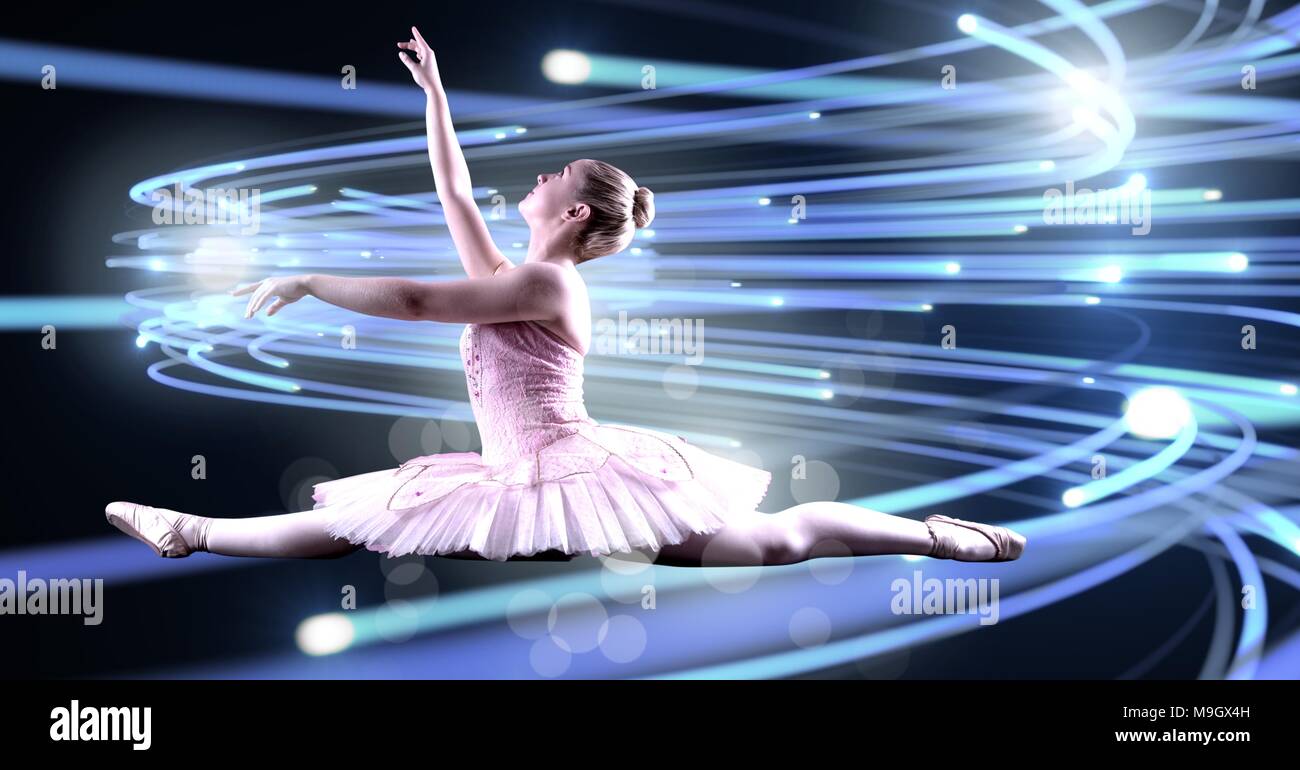 Ballet Dancer tanzen mit geschwungenen Linien des Lichtes leuchtende Stockfoto