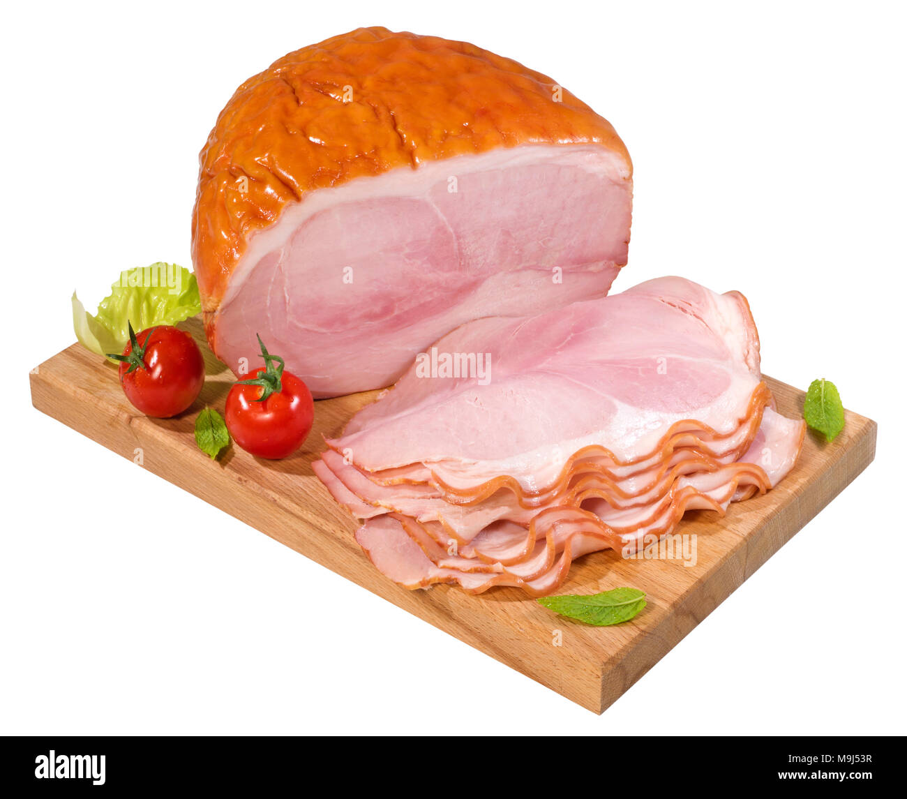 Stück und Scheiben geräucherter Schinken auf einem Schneidebrett Stockfoto