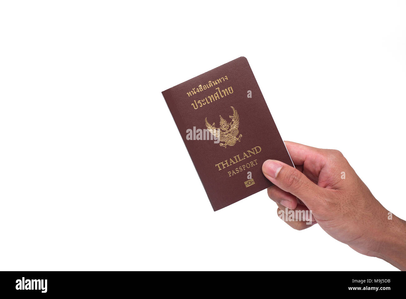 Hand Reisepass aus Thailand auf weißem Hintergrund Stockfoto