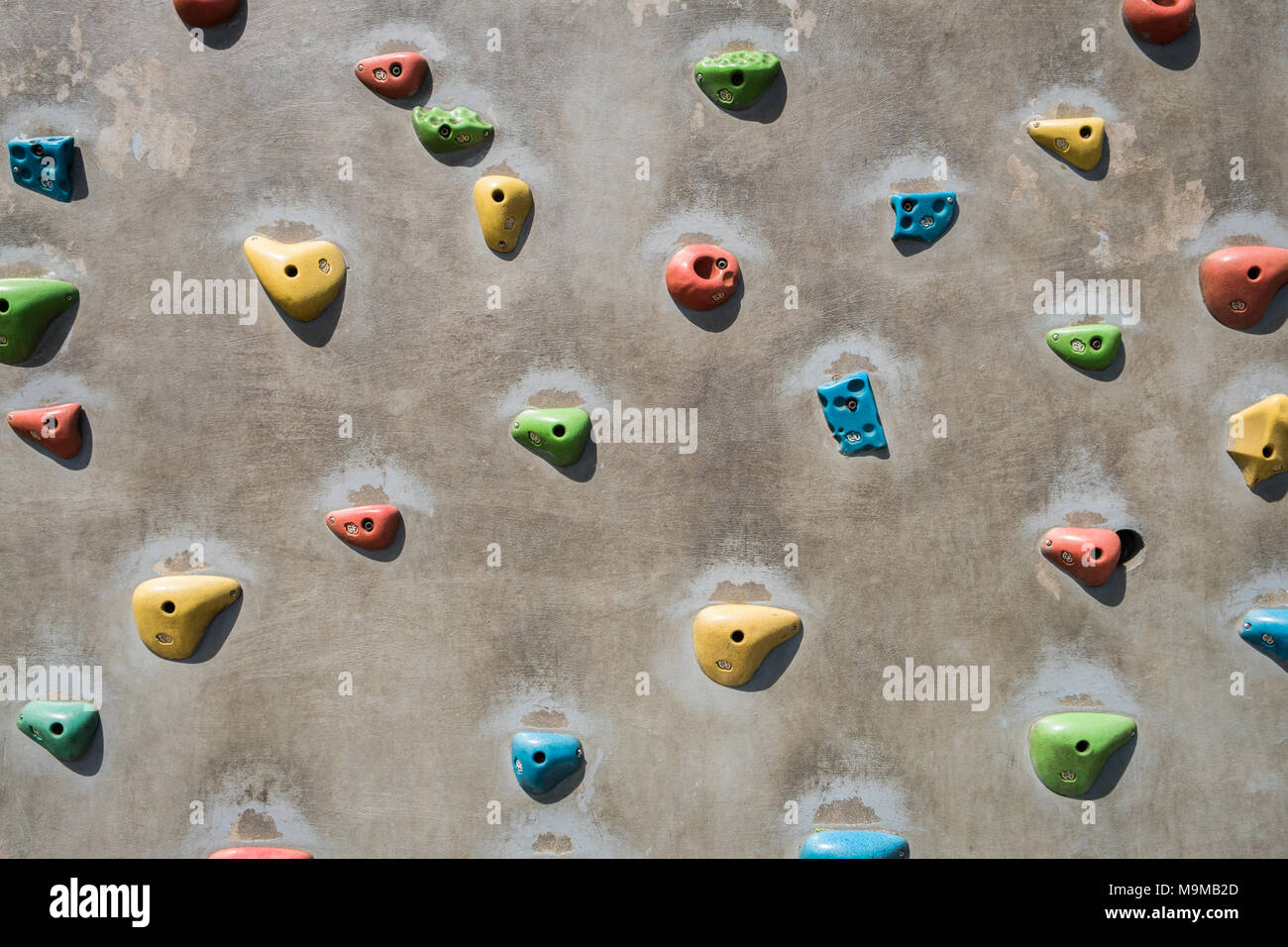 Künstliche Kletterwand Kletterwand zum Üben - Klettern - Hintergrund Stockfoto