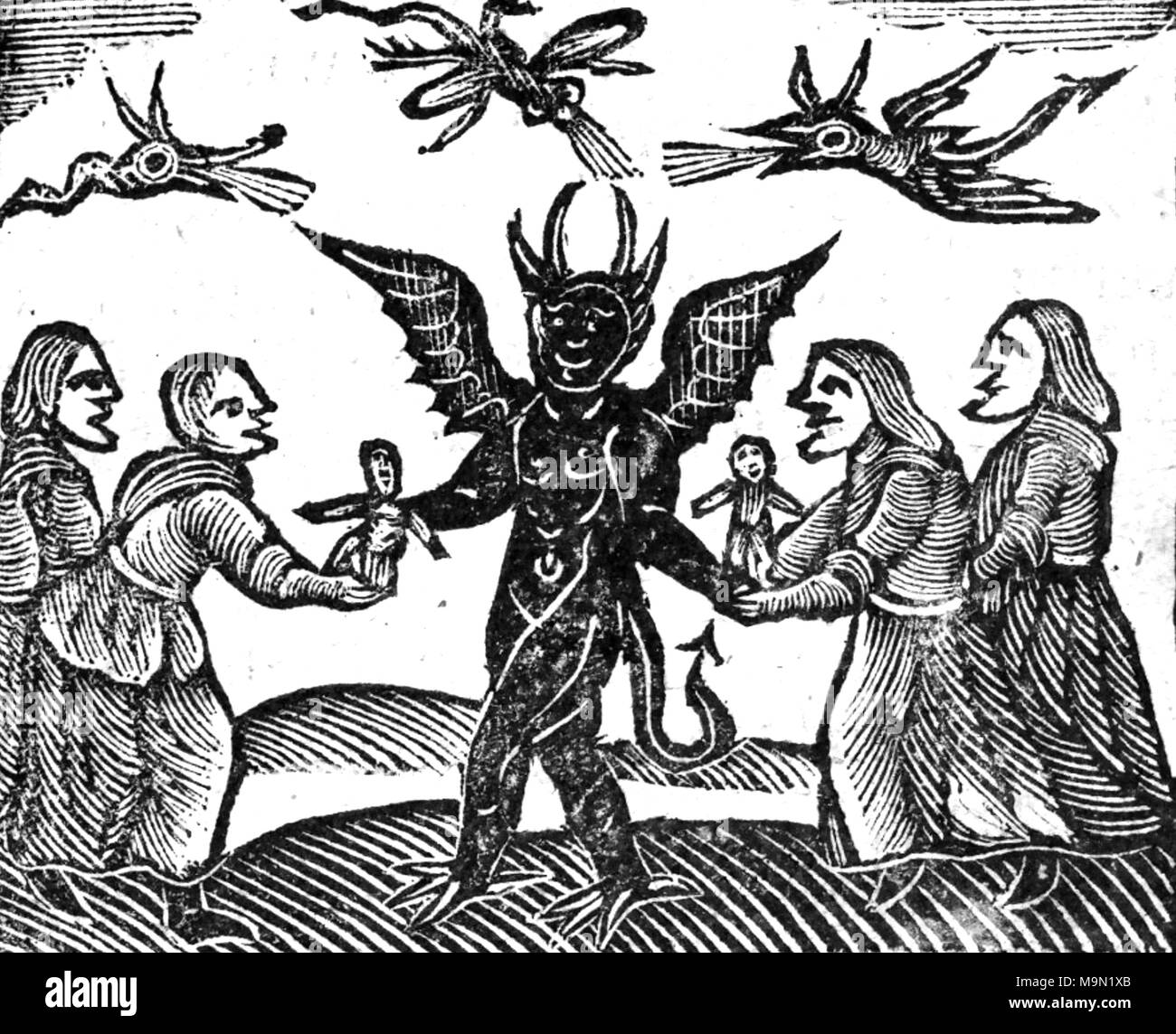 Hexerei eine Gruppe von Hexen mit Wachs Bildnisse an den Teufel in einem Holzschnitt aus dem 17. Jahrhundert Stockfoto