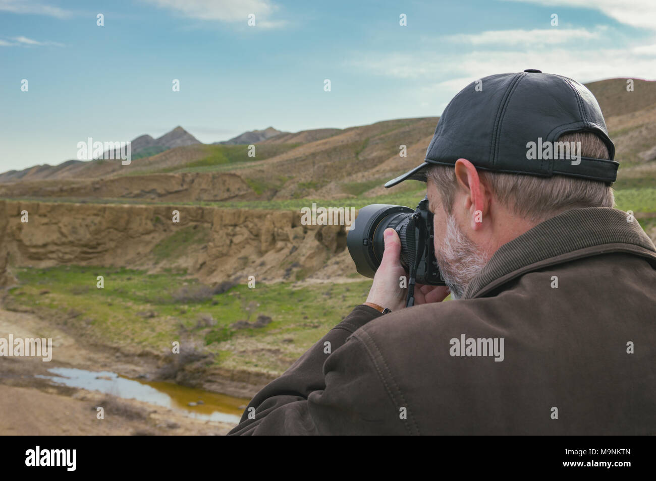 Natur Fotograf in den Bergen Stockfoto