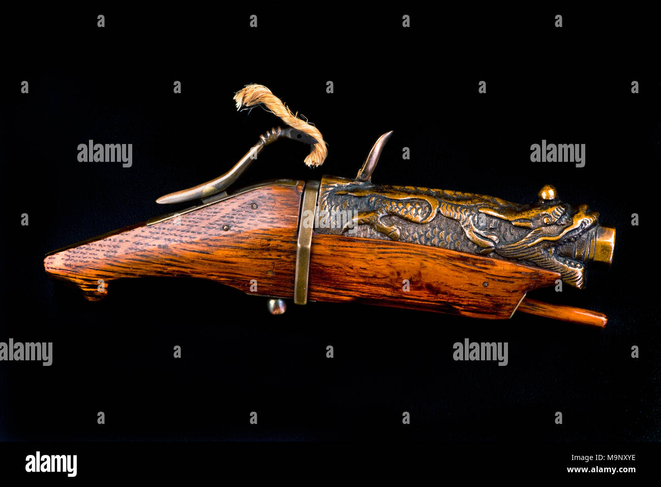 19. Jahrhundert Chinesische bronze Dragon matchlock Pistole, rufen Sie eine Hand connon. Stockfoto