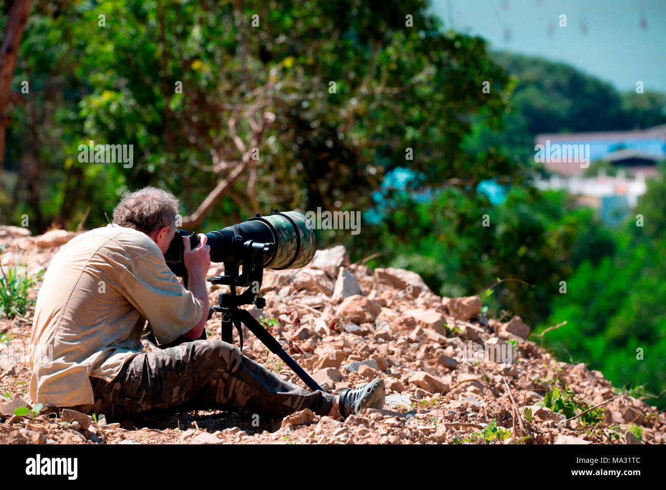 Fotograf mit einem großen Objektiv (600 mm) Stockfoto