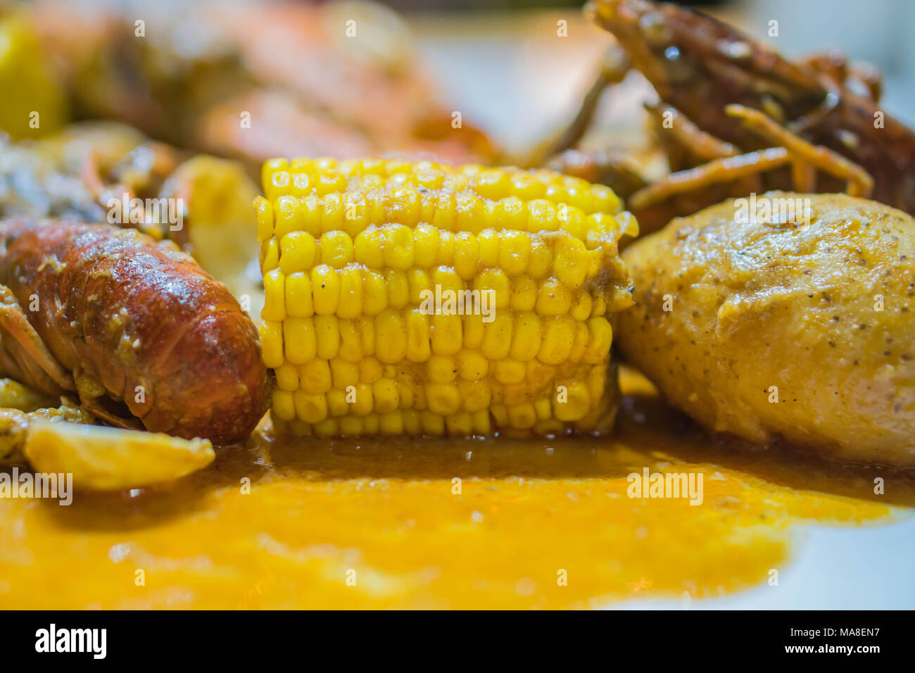 Finger lecken Meeresfrüchten Eintopf. Stockfoto