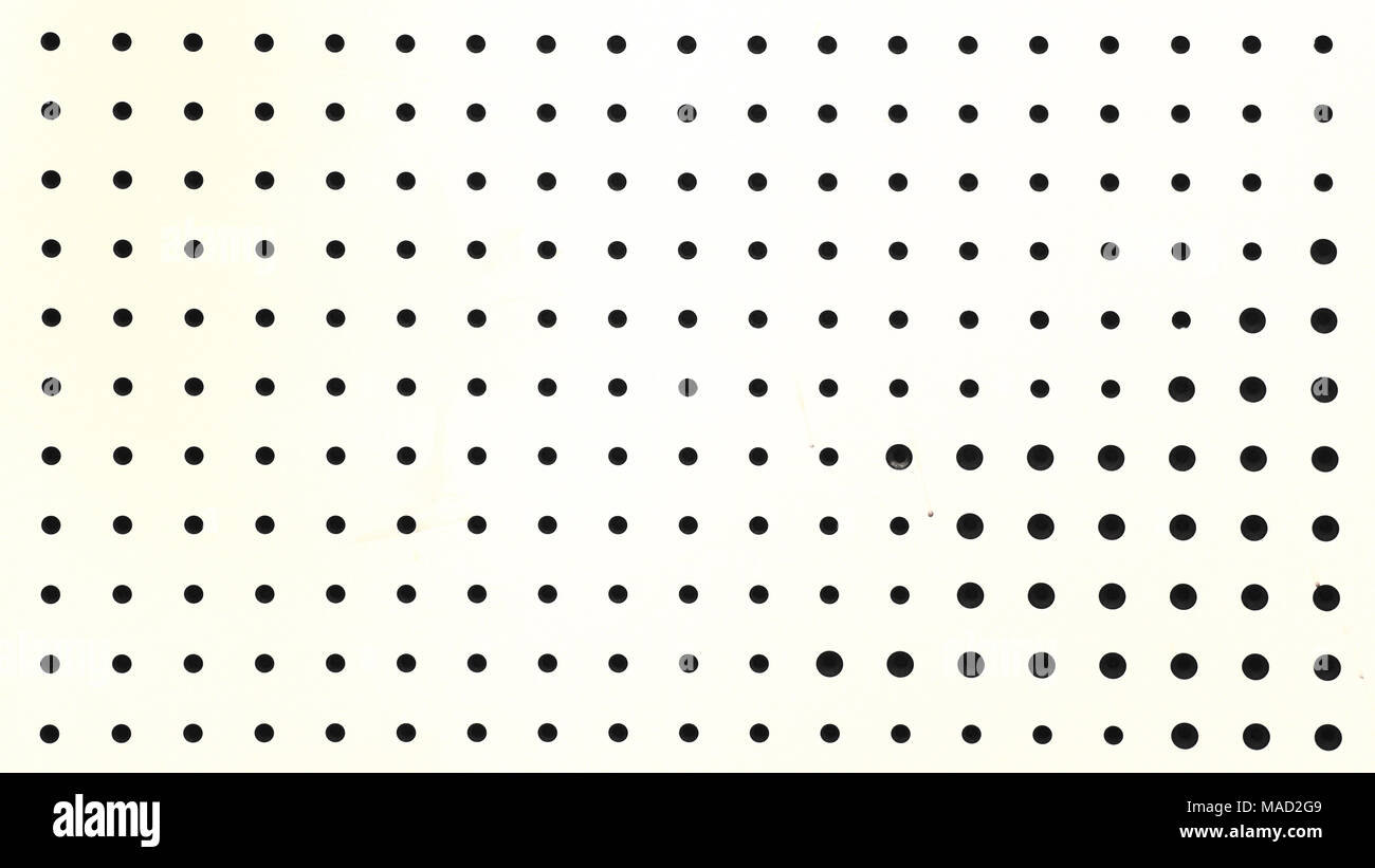 Schwarze gepunktete Textur auf einem weißen Hintergrund. Moderne Kulisse. Stockfoto