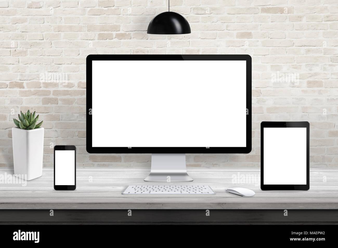 Reaktionsschnelle Anzeigegeräte für Website Design Promotion. Isolierte Bildschirm für mockup. Mauer im Hintergrund. Stockfoto