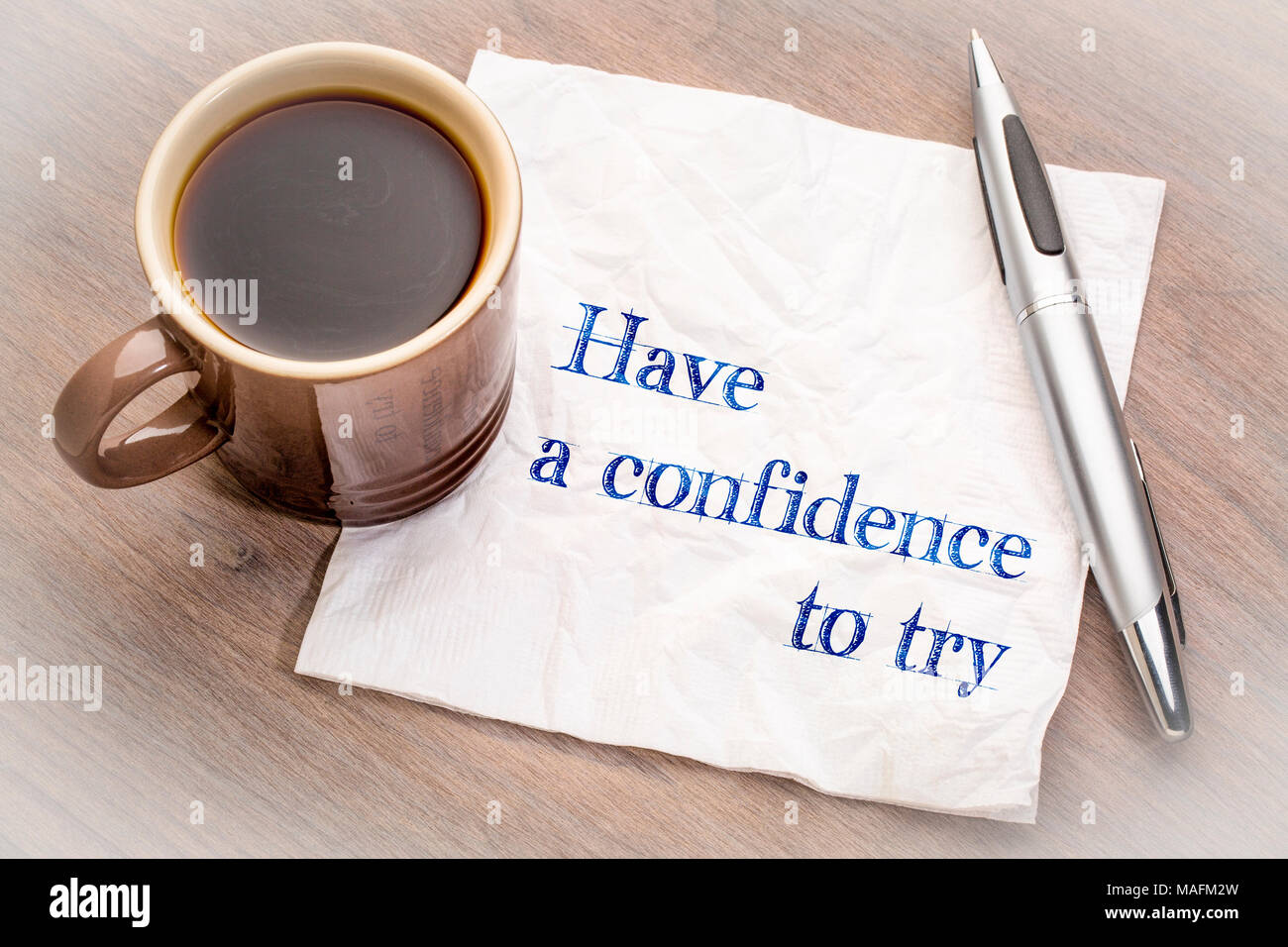 Vertrauen Beratung - Handschrift auf Serviette, um zu versuchen, mit einer Tasse Kaffee Stockfoto