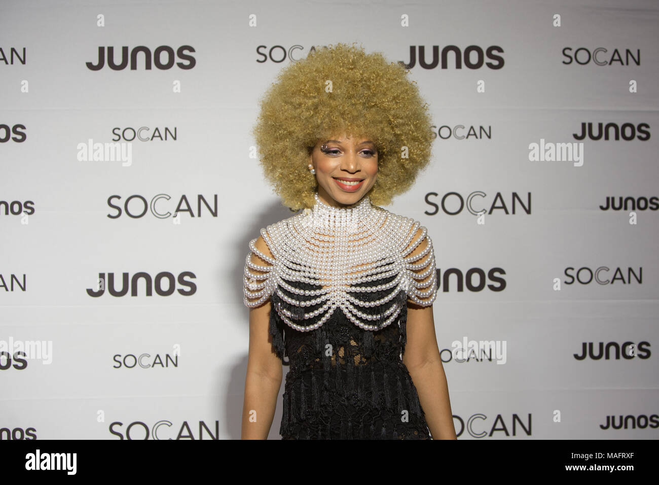 Vancouver, Kanada. 24. März, 2018. Ammoye betäubt auf dem roten Teppich an der 2018 Juno Awards Gala in Vancouver. Credit: Bobby Singh/Alamy leben Nachrichten Stockfoto