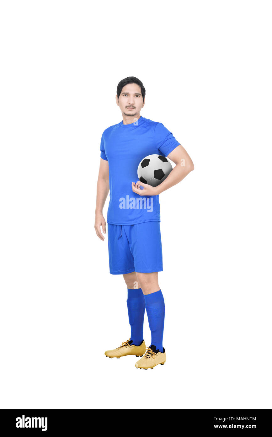 Jungen asiatischen Fußball-Spieler, die auf weißem Hintergrund Stockfoto