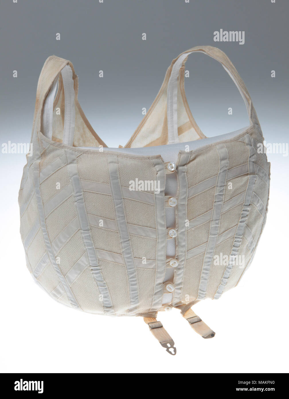 Frau Off-white Baumwolle Mesh entbeintes Büste Oberteil. Das Entbeinen wird mit leinwandbindung Baumwolle überzogen. Tasten auf der Vorderseite und Schnürung auf der Rückseite. Titel: Woman's Mesh entbeintes Büste Oberteil. um 1910. B und J La Whalon Corsette Stockfoto