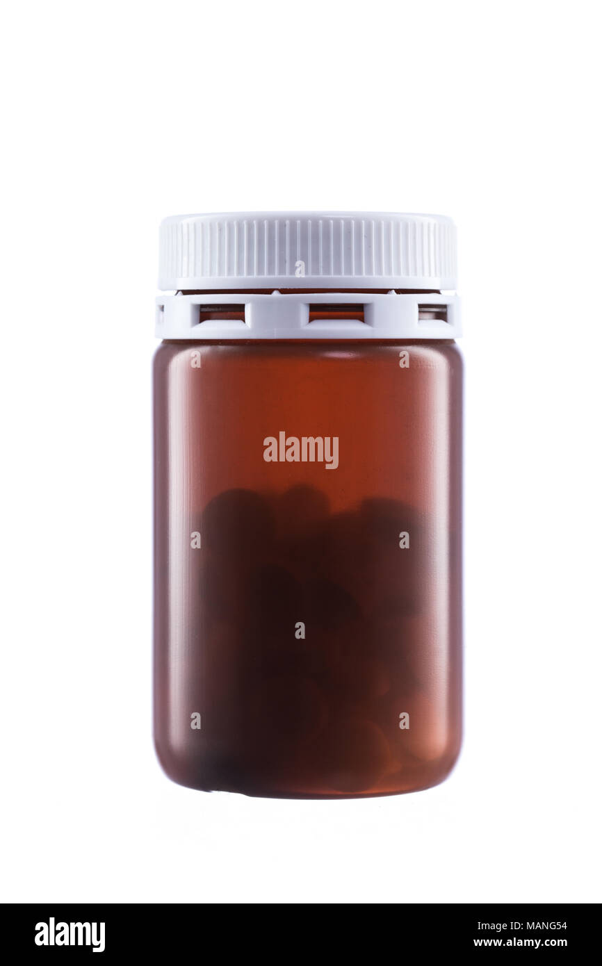 Weiße Pillen aus der Container auf weißem Hintergrund Stockfoto