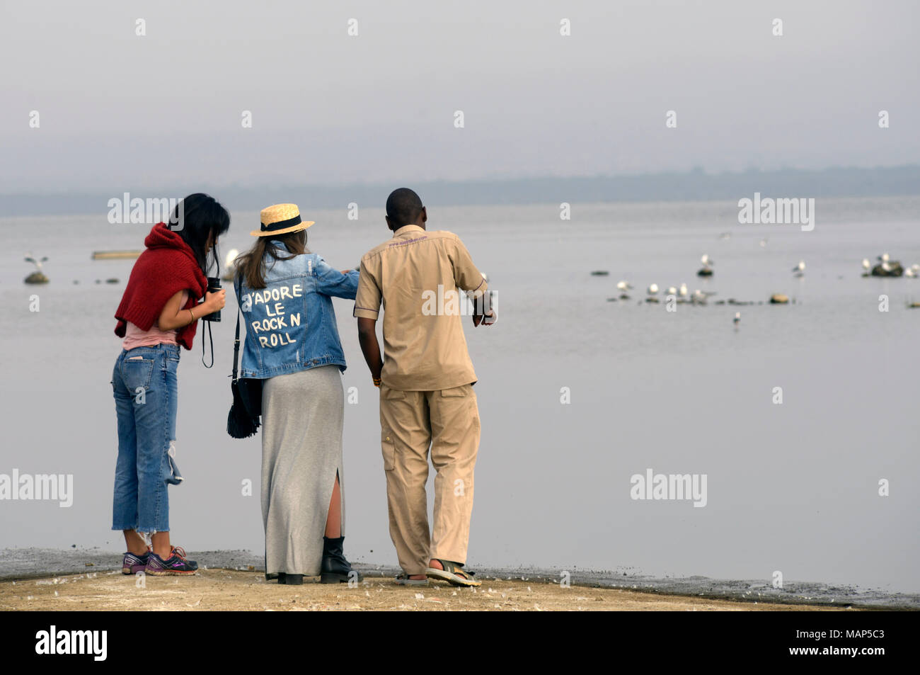 Touristen und Reiseführer, Lake Nakuru, Kenia. Stockfoto