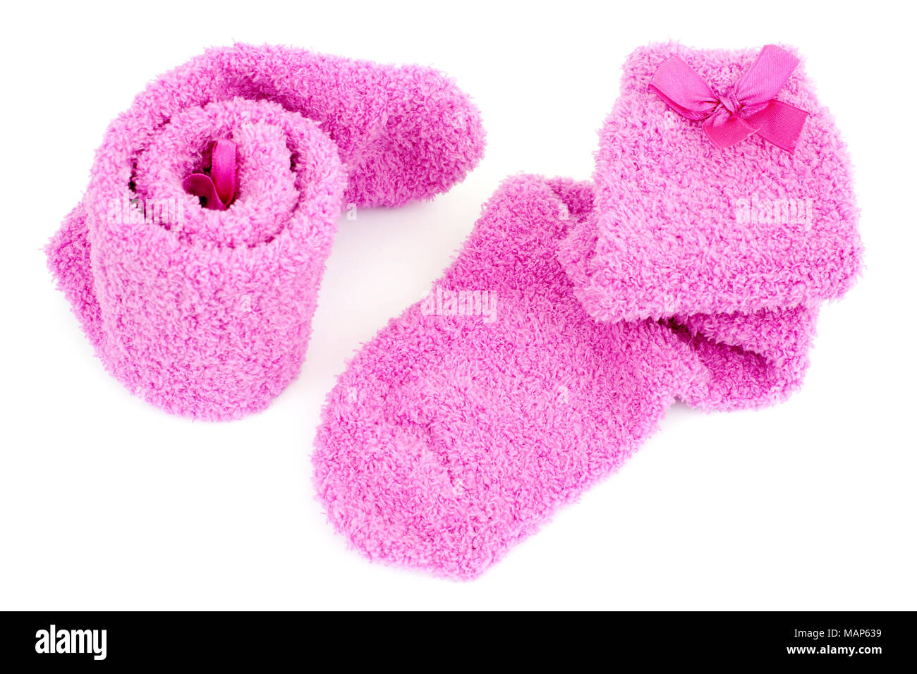 Rosa Socken für das Baby auf Weiß Stockfoto