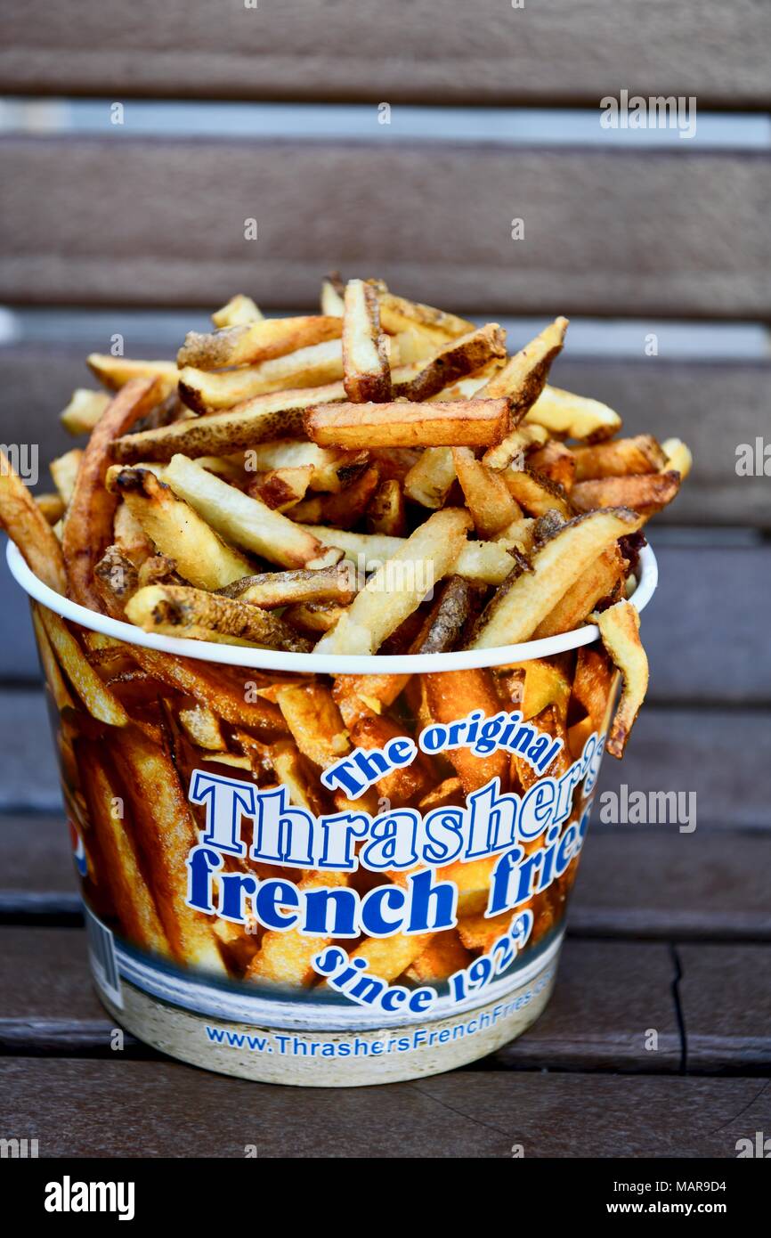 Große Wanne französischen Thrasher Pommes von der Strandpromenade in Ocean City, Maryland, USA Stockfoto