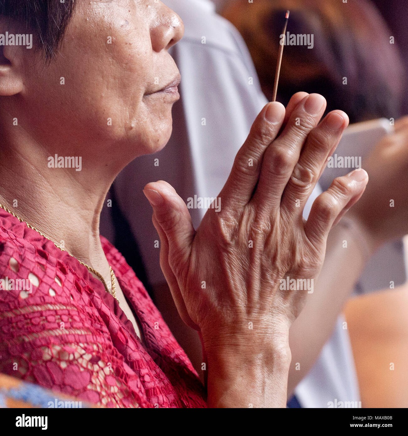 Betende Hände Feiern zum chinesischen Neujahr, Hände zusammen Stockfoto