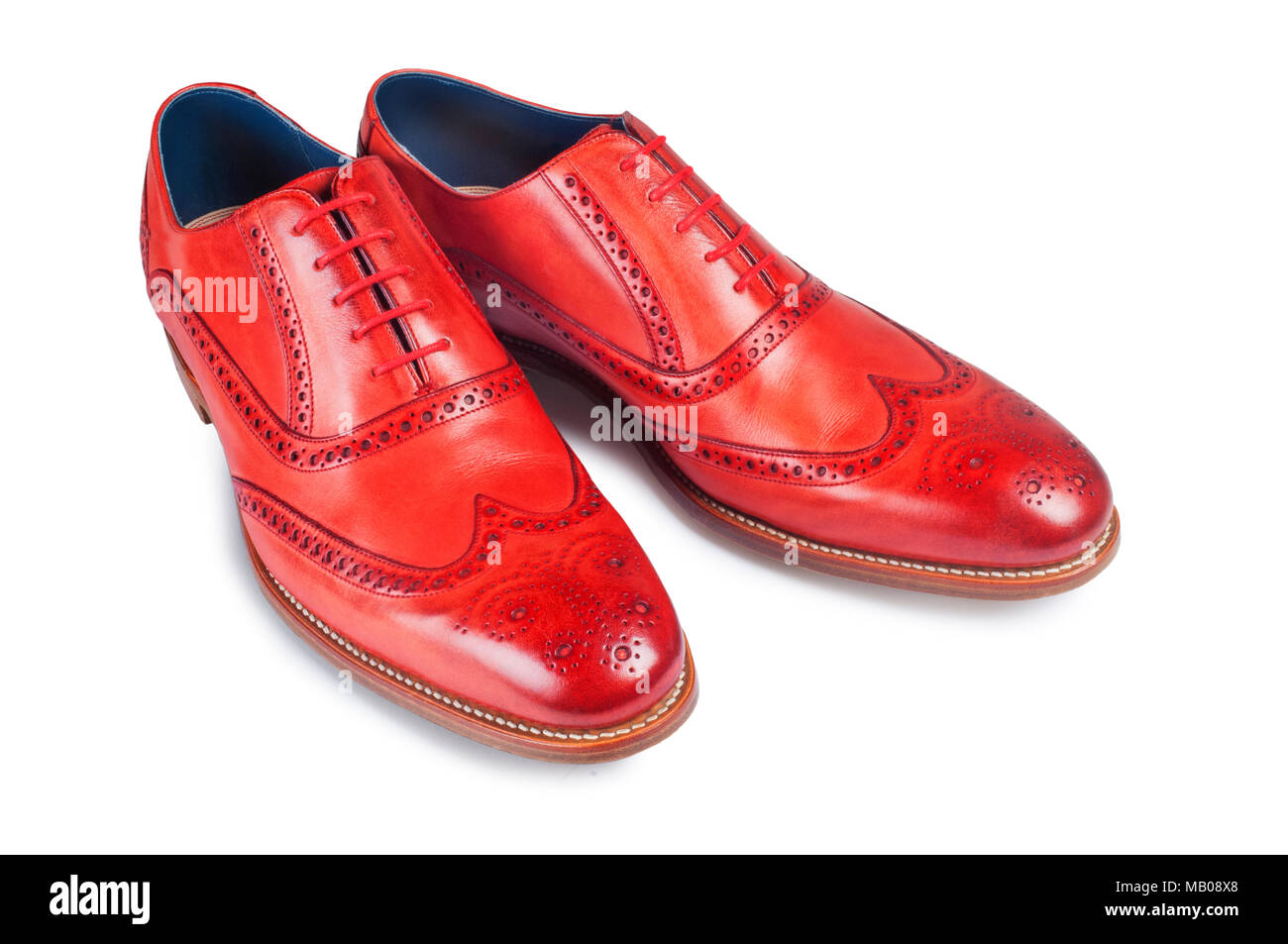 Studio Aufnahme eines Mans rot Leder brogue isoliert auf Weiss - Johannes Gollop Stockfoto