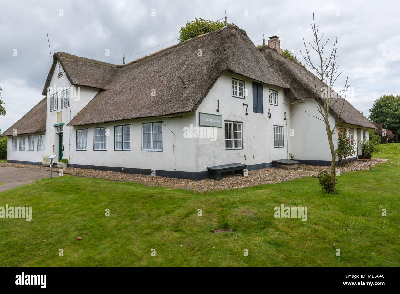 Heimatmuseum oder lokalen Museum, eine traditionelle friesische Haus mit Reetdach, Keitum, Nordsee Insel Sylt, Schleswig-Holstein, Deutschland Nord Stockfoto