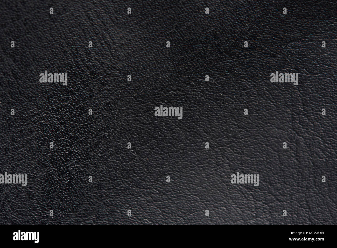 Schwarz Leder Oberfläche Makro. Schwarz Leder material Textur Stockfoto