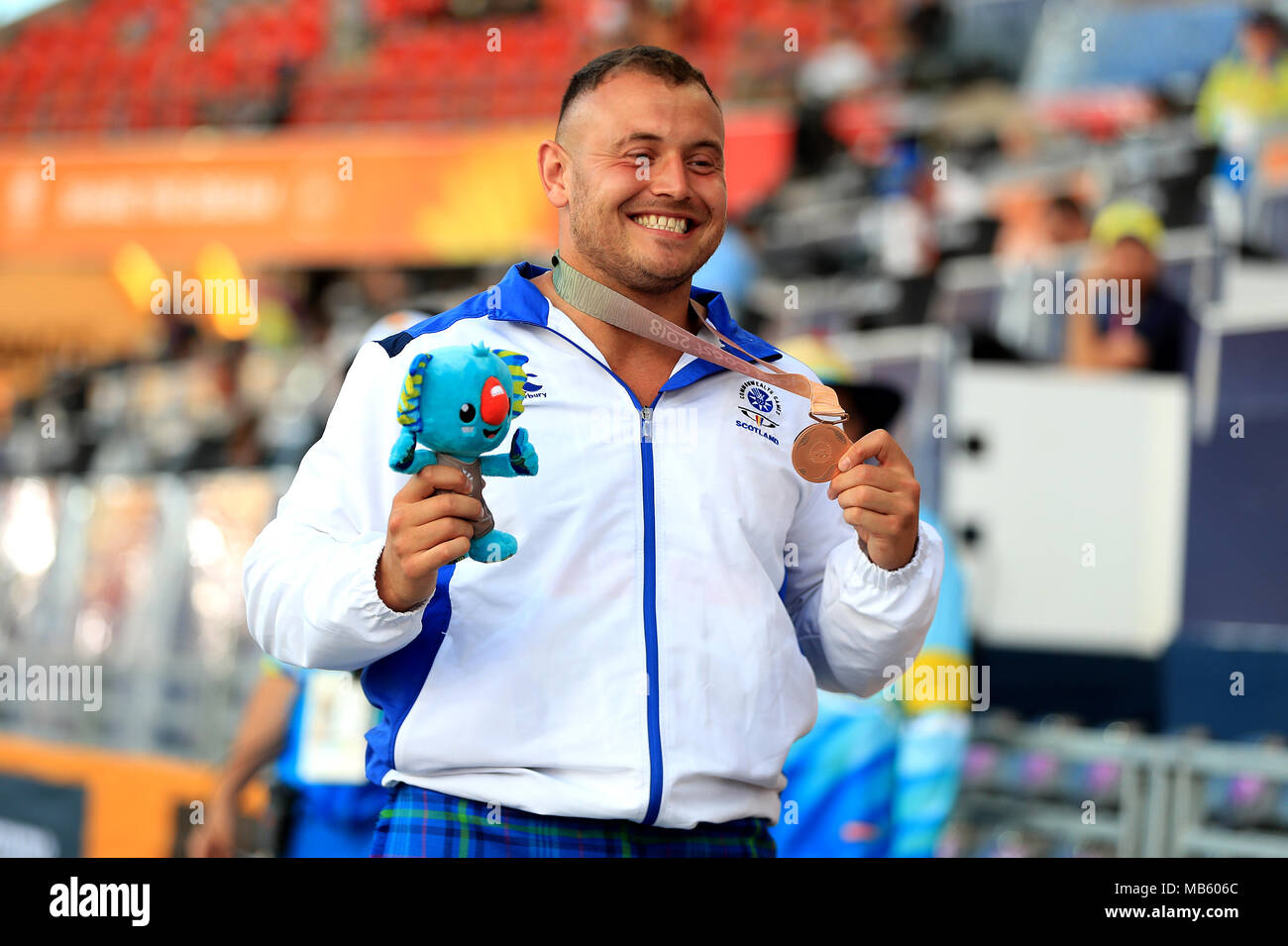 Schottland's Mark Trocken feiert mit seiner Bronzemedaille bei den Herren Hammer Finale bei den Carrara Stadion bei Tag vier der 2018 Commonwealth Games in der Gold Coast, Australien werfen. Stockfoto